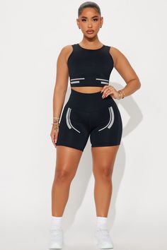 Available In Black. Active Top Scoop Neck Sleeveless Padded Cropped Active Biker Short High Waisted, Elastic Waistband Elevate Reflective Detail High Performance Stretch Body: 73% Polyester 27% Spandex Inner Mesh: 82% Nylon 18% Spandex Imported | Sprint Reflective Elevate Active Set in Black size XS by Fashion Nova Black Seamless Tank Activewear, Sleeveless Black Seamless Activewear, Black Compressive Sleeveless Crop Top, Black Seamless Sleeveless Tank Top, Black Sleeveless Seamless Tank Top, High Stretch Black Tank Sports Bra, Black Sports Bra With Built-in Bra, Black Stretch Tank Sports Bra, Black Sporty Seamless Tank Top