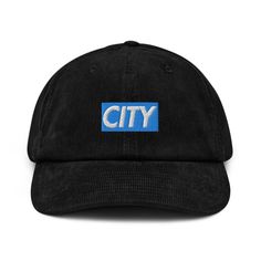 Manchester City, known simply as City! This City hat makes for a great gift for the ultimate Manchester City FC fan. * 100% cotton corduroy * Soft, unstructured crown * Cotton twill sweatband and taping * Adjustable buckle This product is made especially for you as soon as you place an order, which is why it takes us a bit longer to deliver it to you. Making products on demand instead of in bulk helps reduce overproduction, so thank you for making thoughtful purchasing decisions! All sales final Winter Cotton Snapback Hat With Curved Brim, Winter Cotton Snapback Hat With Flat Brim, Winter Cotton Baseball Cap With Flat Brim, Winter Cotton Dad Hat With Curved Bill, Winter Cotton Dad Hat, Urban Style Adjustable Cotton Hat, Cotton Baseball Cap For Winter Streetwear, Winter Cotton Trucker Hat With Flat Brim, Urban Hats With Logo Patch