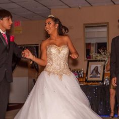 a bride and groom dancing at their wedding reception