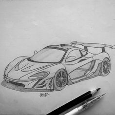 a pencil drawing of a sports car on paper