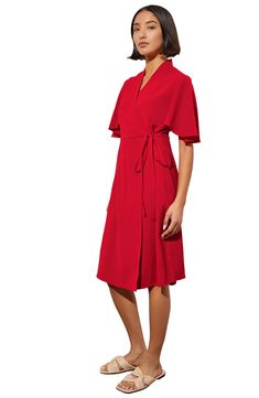 A wrap waistline accentuates your figure in a butterfly-sleeve dress crafted from airy crêpe de Chine. 38" length Surplice V-neck Short sleeves 100% polyester Machine or hand wash, dry flat Imported Evening Wrap Dress With Short Sleeves And Faux Wrap, Chic Wrap Dress With Tie Waist And Flutter Sleeves, Flowy V-neck Wrap Dress For Evening, Flowy V-neck Evening Wrap Dress, Chic V-neck Wrap Dress With Draped Sleeves, Chic Flowy Wrap Dress With Flutter Sleeves, Formal Flowy V-neck Wrap Dress, Evening Wrap Dress With Tie Waist And Short Sleeves, Elegant Flutter Sleeve Wrap Dress