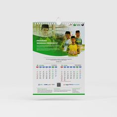 a green and white calendar with people on it