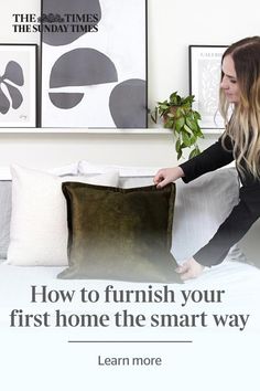 a woman holding a pillow in front of a bed with the caption how to finish your first home the smart way