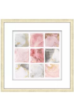 a white frame with pink and grey squares