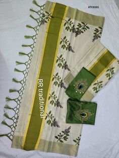 Kerala Golden  Tissue Tulsi printed Set Mundu with Stitched Blouse or Blouse material only . 1 No Pack:  - 1 Set length  2.80 mtr  and 1 Mundu Piece length  2.00 mtr +  Blouse Material length 1 mtr Style Code available are  KTC0101, KTC0102, KTC0103, KTC0104, KTC0105, KTC0106, KTC0107, KTC0108, KTC0109     You  can order SETMUNDU  with STITCHED BLOUSE OR WITH BLOUSE MATERIAL ONLY  (Non Stitched). - YOU CAN ALSO SELECT DHL SHIPPING OR INDIAPOST SHIPPING - 1). Indian Postal Service - ( 15 - 20 days for delivery) 2).  DHL Express   (7-10 days for delivery)   If stitched blouse need, we give a measurement chart at the time of order. As per the measurement given by the customer  we will stich the blouse with separate lining material. It will take minimum 10 days for dispatch. Please provide you Cotton Traditional Wear With Printed Motifs For Wedding, Unstitched Cotton Sets With Motifs, Traditional Sets With Multicolor Embroidery And Printed Motifs, Semi-stitched Cotton Blouse Piece With Pallu, Cotton Saree Set With Printed Motifs, Cotton Sets With Motifs For Diwali, Cotton Sets With Multicolor Embroidery And Printed Motifs, Cotton Silk Sets With Kalamkari Print For Puja, Green Kalamkari Print Unstitched Sets