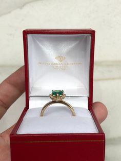 Featured is a stunning 1.43tcw natural teardrop Brazilian emerald and diamond halo engagement ring. The center gemstone is a genuine emerald handset in a 14K yellow gold prong setting. The emerald has a medium-green color and good eye clarity. Micro pave diamonds are placed delicately in the halo setting and mid-way down the shank. The diamonds are beautifully faceted and clean to the eye. Setting Style: Halo Setting Material: 14K Yellow Gold Main Stone: Emerald Shape: Pear Cut Measurements: 10 Emerald Cluster Ring With Halo Setting For Wedding, Emerald Halo Design Wedding Ring, May Birthstone Diamond Ring With Halo Design, Teardrop Brilliant Cut Emerald Wedding Ring, Emerald Cluster Ring With Halo For Anniversary, 14k Gold Emerald Ring With Halo Setting For Wedding, Wedding Emerald Ring With Halo, Wedding Teardrop Emerald Ring With Brilliant Cut, Formal Pear-shaped Emerald Ring With Halo Setting