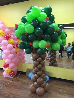 a balloon tree in the middle of a room