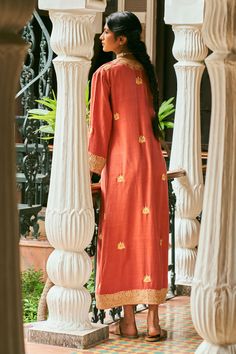 Buy Orange Matka Silk Hand Embroidery Kashmiri V Neck Sijh Kaftan For Women by The Whole Nine Yards Online at Aza Fashions. Floor-length Embroidered Raw Silk Kurta, Embroidered Floor-length Raw Silk Kurta, Embroidered Ceremonial Dress For Diwali, Ceremonial Embroidered Dress For Diwali, Elegant Long Dress With Cutdana, Silk Floor-length Kurta With Zari Work, Silk Kurta With Zari Work, Floor-length, Floor-length Silk Kurta With Zari Work, Embroidered Silk Tunic Kurta