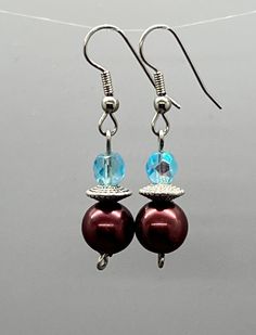 These lovely handmade drop earrings will make you look and feel beautiful every time you put them on. Lightweight, these dainty earrings measure approx 1.5 inches in length and swing freely from silver-plated ear wire with every move of your head. They can be worn year-round with everything from casual to formal attire with confidence and ease. They make a cheap gift option for her or buy them for yourself and enjoy the compliments that come your way.  #doubleddezinez #handmadedropearrings #bead Cheap Gift, Cheap Gifts, Feel Beautiful, Formal Attire, Dainty Earrings, Bead Earrings, Ankle Bracelets, Ear Wire, How To Feel Beautiful