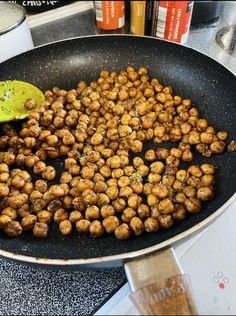 some food is being cooked in a frying pan