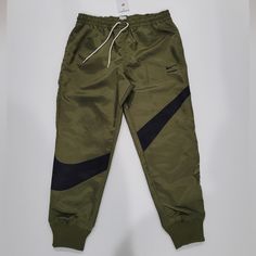 Rare Nike Sportswear Big Swoosh Heavy Jogger Olive Green Black Men's Size Xl Dd6057-326 Nwt. Brand New With Tags Nike Sportswear Joggers For Outdoor, Nike Joggers For Outdoor Sportswear, Nike Outdoor Sportswear Joggers, Nike Moisture-wicking Joggers For Streetwear, Nike Urban Activewear For Sports, Nike Athleisure Joggers For Outdoor, Nike Green Activewear For Jogging, Green Nike Activewear For Jogging, Nike Green Activewear For Outdoor