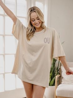 Show your unique style with this oversized show-stopper. The details: 100% Cotton Oversized Fit One Size Fits Most Officially Licensed Front/Back Design Graphic Print Drop Shoulder Tops For Loungewear, Drop Shoulder Graphic Print Tops For Loungewear, Oversized Graphic Print Top With Drop Shoulder, Spring Graphic Tee With Drop Shoulder, Oversized Relaxed Top With Graphic Print, Relaxed Oversized Top With Graphic Print, Trendy Drop Shoulder T-shirt For Loungewear, Oversized Cotton Drop Shoulder Tops, Oversized Tops With Letter Print