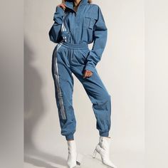 Ivy Park X Adidas Nylon Track Pants ( H33308) New With Tags Size Xs Unisex Color Blue/ White Ivy Park X Adidas Chic Performance Collection The All-Gender Track Pants Offer A ‘90s Style Made From High Gloss Nylon And A Baggy Fit With An Adjustable Drawcord Waist And Ankle Cuffs. Drawcord On Elastic Waist - Side Zip Pockets - Leg Pocket - Back Pocket - Elastic Cuffs - 100% Nylon Plain Weave Fast Shipping Same Or Next Day With Tracking Information Blue Fitted Tracksuit With Pockets, Fitted Blue Tracksuit With Pockets, Blue Spring Tracksuit For Streetwear, Sporty Spring Tracksuit With Pockets, Sporty Blue Tracksuit For Spring, Blue Spring Tracksuit Sportswear, Nylon Pants Outfit, Blue Adidas Pants, Adidas Pants Outfit