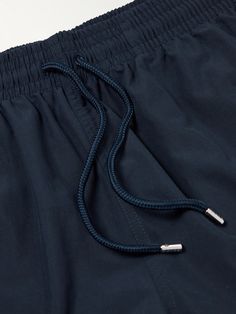 Cut from lightweight, quick-drying navy shell, Derek Rose's swim shorts have a comfortable elasticated waistband and practical mid-length. They come with a drawstring carrying bag that's handy for storing them when damp. Beachwear Bottoms With Drawstring For Outdoor, Navy Nylon Short Bottoms, Sporty Nylon Swim Trunks With Functional Drawstring, Casual Travel Bottoms With Drawstring, Navy Nylon Shorts, Relaxed Fit Nylon Swim Trunks With Drawstring, Nylon Swim Trunks With Drawstring And Relaxed Fit, Navy Nylon Swim Trunks For Summer, Functional Nylon Swim Trunks With Drawstring