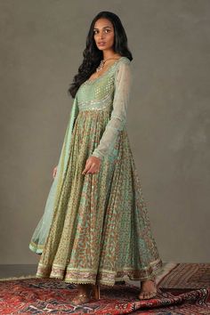 Green floor length anarkali with all over floral prints and roshafi, zardozi embroidery on the bodice and sleeves. Paired with a churidar and embroidered dupatta. - Aza Fashions Bollywood Style Floor-length Choli With Chikankari Embroidery, Floor-length Bollywood Choli With Chikankari Embroidery, Semi-stitched Anarkali Choli With Chikankari Embroidery, Anarkali Choli With Chikankari Embroidery Semi-stitched, Festive Chikankari Embroidery Maxi Anarkali Set, Festive Chikankari Embroidery Anarkali Set, Festive Maxi Anarkali Set With Chikankari Embroidery, Bollywood Style Chikankari Anarkali Set, Bollywood Style Chikankari Anarkali Maxi Set