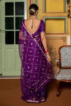 Purple saree with floral gota patti work motifs and zari border. Comes with unstitched blouse fabric.
Components: 2
Pattern: Embroidered
Type Of Work: Gota Patti
Fabric: Pure Kota Silk
Color: Purple
Other Details: 
Saree Length: 5.5 Mtrs
Note: Stitched blouse worn by the model is not for sale
Disclaimer: Since these products are handcrafted and hand dyed and hence may have slight irregularities and dissimilarities each time it is crafted. This is a natural outcome of human involvement in the pro Eid Silk Pre-draped Saree With Gota Work, Festival Chanderi Pre-draped Saree With Gota Work, Festive Pre-draped Saree With Gota Work, Unstitched Purple Pre-draped Saree With Dori Work, Dola Silk Pre-draped Saree With Sheer Dupatta For Diwali, Purple Pre-draped Saree With Dori Work, Purple Chanderi Pre-draped Saree For Reception, Festival Banarasi Silk Pre-draped Saree With Dori Work, Festive Chanderi Traditional Wear With Gota Work