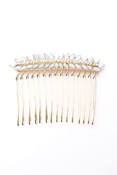 Keep your hairstyle as glamorous as you are with this sparkling pearl hair comb with a blue leaf design! Pearl Hair Comb, Pearl Hair Combs, Your Hairstyle, Hair Combs, Blue Leaves, Pearl Hair, Hair Comb, Leaf Design, Bobby Pins