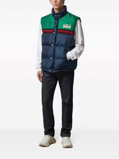 Padded vest by GUCCI in blue and green characterized by logo patch, sleeveless, button closure and drawstring waist. This item is in size 48 and the color is Blue Gucci Cotton Outerwear, Gucci Outerwear With Pockets For Streetwear, Blue Cotton Gucci Outerwear, Gucci Sporty Streetwear Outerwear, Gucci Sporty Outerwear For Streetwear, Sporty Gucci Outerwear For Streetwear, Gucci Cotton Outerwear With Pockets, Gucci Casual Cotton Outerwear, Casual Gucci Cotton Outerwear