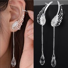 Angel Wings Water Drop Crystal Clip On Earrings These Beautiful Crystal Earrings Look Like Delicate Angel Wings, With A Water Droplet, Or Tear Drop Dangling From The Wing. There Is A Clip At The Lobe And At The Top Of The Ear To Keep It Secured In Place. Zinc Alloy, Crystals, Rhinestones Comes With A Sheer Organza Gift Bag Gothic, No Hole, Bling, Glam, Sparkle, Shimmer, Whimsical, Fairy, Punk, Bff Gift, Celebration, Birthday, Anniversary, Stocking Stuffer, Christmas, Valentines, Easter, Mother’s Cincin Diy, Silver Crystal Earrings, Fashion Angels, Tassel Earing, Angel Wing Earrings, Tassel Jewelry, Ear Stud, Wing Earrings, Earrings Drop