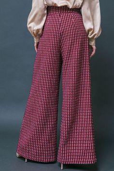 Tweed Wide Leg Pearl Button Plaid Pants Brand: Flying Tomato Style: IP8039 Fabric: 100% Polyester Details: A tweed pant featuring high waist, front button zipper closure, two front faux pockets and wide leg Chic Plaid Wide Leg Pants, Plaid Tweed Bottoms For Fall, Elegant Plaid Wide-leg Pants, Wide-leg Plaid Pants With Houndstooth Pattern, Plaid High-waisted Wide Leg Pants For Fall, Fall Plaid High-waisted Wide Leg Pants, Chic Wide Leg Bottoms With Houndstooth Pattern, Fall Houndstooth Wide Leg Pants, Tomato Color