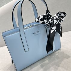 PRD Re-Edition 1995 Brushed Mini Handbag Blue For Women, Women’s Bags 8.6in/22cm Rep 1:1 This handbag, a re-edition of an iconic PRD bag of 1995, is characterized by its elegant geometric silhouette with distinct, minimalist lines. Formal allure and practicality meet in its design with a central zipper closure, enhanced by the sophisticated accent of the screen-printed lettering logo. The accessory is made of fine brushed , an expression of the brand’s expertise. Size: 22 x 18 x 8 cm Prada Re Edition, Louis Vuitton Shirt, Chanel Shirt, Gucci Gg Marmont, Lettering Logo, Mini Handbag, Reversible Belt, Luxury Products, Mini Handbags