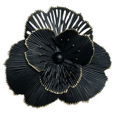 a black and gold flower on a white background