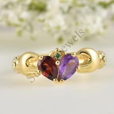 pear Shaped Natural Garnet And  Natural Amethyst Engagement Ring ,Wedding  Band * Item Description >Metal:- 925 Sterling Silver >Band Colour:-Yellow >Gem Stone: natural garnet/ Natural Amethyst > Gem stone size: 4x6 mm / 2 pcs > Gem Shape  :- Pear > Gem Colour :- Red / blue > Side Stone :- Cubic Zircon >Gem Shape:- Round > Gem Colour :- white > High Quality Gem Stone Setting >Plating  Availability:-  White Rhodium plating/Yellow Gold Plating/Rose Gold Plating/ Silver FEATURE  >  CUSTOM  ORDER<   We can create almost any ring , earrings , necklace you desire with high quality and   affordable price. please message us for details. curved wedding bands can be customized for your engagement ring. please order asap and send me  some pictures of your ring.  > ENGRAVING<   I will be happy to add Pear-shaped Promise Rings For Valentine's Day, Pear-shaped Diamond Ring With Gemstone As Gift, Pear-shaped Diamond Ring Gift, Heart Cut Multi-stone Anniversary Rings, Pear-shaped Rings For Valentine's Day Gift, Heart-shaped Multi-stone Wedding Rings, Teardrop Yellow Gold Ruby Ring For Wedding, Pear Shaped Multi-stone Ring As Gift, Pear Shaped Multi-stone Ring For Gift