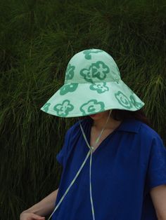 Lost Pattern Women's Reversible Sun Hat Our Reversible Wide Brim Sun Hat in pink is the perfect summer accessory. Whether you're riding your bike through the park or running errands around town, this reversible wide brim sun hat will keep your face shielded from harmful rays while still looking stylish. The wide brim sun hat design provides extra protection for your face and neck, while the breathable material keeps you cool and comfortable throughout the day.The Reversible Wide Brim Sun Hat is Wide Brim Sun Hat, Hat Design, Pack Up, Summer Accessories, Independent Designers Fashion, Sun Hat, Wide Brimmed, Hat Designs, Perfect Summer