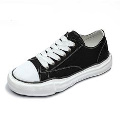 black low top shoes Casual Black Slip-on Sneakers With Contrast Sole, Sporty Lace-up Canvas Shoes With Gum Sole, Comfortable Lace-up Canvas Shoes For Streetwear, Comfortable Flat Heel Canvas Shoes For Streetwear, Comfortable Streetwear Canvas Shoes With Vulcanized Sole, Comfortable Round Toe Canvas Shoes For Streetwear, Casual Black Slip-on Sneakers With Textured Sole, Sports Canvas Shoes With Textured Sole, Casual Skate Shoes With Rubber Sole And Round Toe