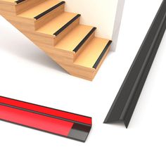 a stair case next to a set of stairs and a red tape on the floor