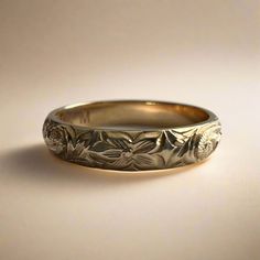 a wedding band with flowers on it