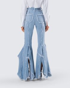 Disco diva 💅 Strut your stuff in these blue frayed jeans constructed from denim fabric and complete with frayed vertical seams and edges, a high-rise fit, and oversized ruffle detailing at the legs 💙 Blue Flare Jeans With Frayed Hem For Fall, Chic Medium Wash Pants With Frayed Hem, Medium Wash Flare Bottoms With Frayed Hem, Denim Blue Flare Pants With Frayed Hem, Fall Denim Pants With Frayed Hem, Fall Denim Ruffled Bottoms, Ruffled Denim Bottoms For Fall, High-rise Denim Blue Flare Jeans With Frayed Hem, Chic Medium Wash Flare Jeans With Frayed Hem