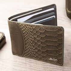 Description: Highlights: The Kobra leather wallet is handmade with cowhide leather with our Kobra pattern. Designed for those who appreciate the functionality and outstanding quality of our leather goods. The soft Vaja leather tends to become softer after a few weeks of regular use developing a fantastic look that breaks in overtime. Shape the Kobra to your needs, one card at a time. THERE IS SOMETHING ABOUT IT Maybe it’s the soft Vaja leather or the minimalist design, but the Kobra leather Wall Luxury Wallet With Zipper Pocket In Modern Style, Luxury Modern Wallet With Zipper Pocket, Modern Luxury Wallet With Zipper Pocket, Luxury Modern Wallet With Smooth Grain, Cheap Functional Leather Wallets, Cheap Leather Wallets With Leather Patch, Luxury Rectangular Wallets For Professional Use, Cheap Elegant Leather Wallets, Luxury Soft Leather Wallet For Daily Use