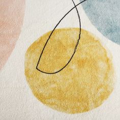 an abstract rug with circles and lines painted on it