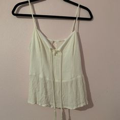 Great For A Party Or Dinner! I’ve Had It For Years But Just Have Never Worn It! So It Doesn’t Have Tags But It Is Practically New!!! Super Cute With Jeans Or A Skirt! Summer V-neck Top With Tassels, Summer V-neck Tops With Tassels, Cotton Spaghetti Strap Tank Top For Party, Cotton Camisole Tank Top For Party, Cotton Camisole With Spaghetti Straps For Party, Cotton Cami Tank Top For Party, Cotton Tank Top For Summer Night Out, Spring V-neck Top With Back Tassel Tie-up, Beach Camisole Tank Top With Tie Straps