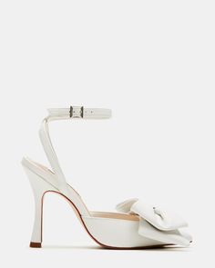 LOVELLA WHITE LEATHER White Heels Homecoming, White Heels With Bow, Hoco Shoes, White Heels Wedding, Dream Wedding Shoes, Ivory Heels, Fun Heels, Christmas Inspo, Leather Wear