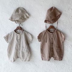 The sweetest linen shortie romper for baby boys. Features a single pocket, with short sleeves and cropped legs. Roomy, oversized fit with a button through fastening. Colour: Brown + Natural Size range: S (0-6 months) M (6-12 months) L (12-18 months) Cotton 100% Cool wash 30 / Cool Iron Beige Tops For Summer Playwear, Cotton Bubble Romper For Playwear, Spring Cotton Bubble Romper With Short Sleeves, Cotton Bubble Romper With Short Sleeves For Spring, Cotton Short Sleeve Bubble Romper For Spring, Cute Bubble Romper With Short Sleeves For Loungewear, Cute Short Sleeve Bubble Romper For Loungewear, Beige Bubble Romper For Summer Playtime, Beige Summer Bubble Romper For Playtime