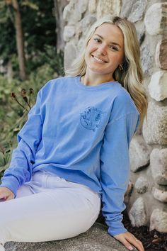 A Lakegirl.com exclusive. One of our most popular items is back, although for a limited time. Comfortable, periwinkle, and Lakegirl. Does it get any better? 100% cotton Relaxed Fit Size Chart Cute Long Sleeve Tops For Everyday, Light Wash Cotton Tops For Everyday, Light Wash Soft-washed Cotton Tops, Everyday Light Wash Cotton Tops, Blue Soft-washed Long Sleeve T-shirt, Blue Screen Print Top For Everyday, Light Blue Relaxed Fit Top With Screen Print, Everyday Blue Tops With Screen Print, Everyday Blue Screen Print Tops