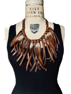 "Braided Leather Necklace- Western Leather Necklace- Western Jewelry- Western Necklace- Long Necklace- Braided Leather Necklace- Fringe Necklace- Boho- Gift  Made with a beautiful medium brown Kodiak leather lacing. Fringes are approximately 6.5\" long and come to a subtle point at the center. Pulls on over the head. This unique piece will become more and more beautiful throughout the years, just like a favorite pair of leather boots. Available in a beautiful neutral brown, so it can be paired with many other different color brown tones accessories.  Leather jewelry is a great addition to your edm wardrobe, burning man fashion, Coachella outfits and music festival accessories!  Ships in one day.  Available in two lengths, 23\" (pictured on model) 28\" not intended for ages 3 and under. Gif Hippie Adjustable Party Jewelry, Hippie Brown Jewelry For Festivals, Brown Hippie Jewelry For Festivals, Hippie Style Adjustable Festival Necklaces, Adjustable Hippie Necklaces For Festivals, Brown Choker Necklace For Party, Handmade Adjustable Jewelry For Concert, Hippie Brown Necklace For Festivals, Brown Hippie Necklace For Festival