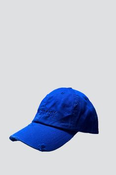 Distressed Blue New York Embroidered Trucker Hat from Assembly New York. Six panel with vent holes. Adjustable back closure. - 100% Cotton - Made in USA Blue Distressed Cotton Baseball Cap, Distressed Blue Snapback Hat, Blue Dad Hat With Embroidered Logo And Curved Brim, Blue Snapback Dad Hat With Embroidered Logo, Blue Dad Hat With Embroidered Logo, Distressed Blue Hat With Curved Brim, Distressed Blue Cap, Blue Distressed Hat With Curved Brim, Distressed Blue Hat With Adjustable Fit