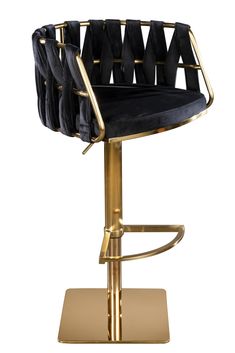 a black velvet and gold metal bar stool