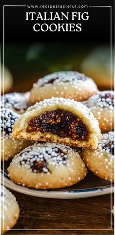 italian fig cookies on a plate with powdered sugar sprinkled over the edges