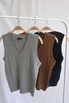 A woven sleeveless knit sweater vest featuring cable-knit stitching Indie Outfits Men, Brown Sweater Vest, Oversized Grey Sweater, Vest Sweater, Amazing Crochet, Crochet Sweaters, Knit Sweater Vest, Cardigan Style, Muslimah Fashion Outfits