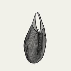 ALAIA shoulder bag in mesh nylon and leather  Flat shoulder strap Open top with self-tie closure  Unlined  Approx. 7.9"H x 15.8"W x 3.9"D Made in Italy Open Top, Bergdorf Goodman, Tops Designs, Shoulder Strap, In Italy, Mesh, Shoulder Bag, Italy, Luxury Fashion