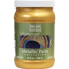 a jar of metallic paint on a white background