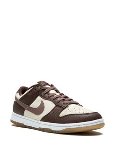 Nike Dunk Low "Plum/Coconut Milk" Sneakers - Farfetch Brown Lace-up Skate Shoes For Streetwear, Nike Brown Basketball Shoes For Streetwear, Sporty Brown Basketball Shoes For Streetwear, Brown Mid-top Basketball Shoes For Streetwear, Brown Lace-up Skate Shoes With Gum Sole, Sporty Brown Basketball Shoes With Round Toe, Sporty Brown Basketball Shoes With Gum Sole, Brown Sporty Basketball Shoes With Gum Sole, Nike Brown Basketball Shoes