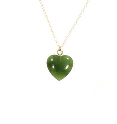 "Jade heart necklace, green heart pendant, Canadian jade pendant, gift for her, natural green stone necklace, 14k gold filled chain A one of a kind Canadian jade heart hanging from a 14k gold filled chain in the length of your choice! Please choose your favorite heart as shown in the fourth photo. The jade pendant measures 15mm. Need a few reasons to love green jade other than for its beauty? ♥ Stability ♥ Longevity ♥ Fertility ♥ Serenity ♥ Wisdom ♥ Practicality ♥ Tranquility ♥ Balance ♥ Peace ♥ Green Heart Cut Necklace For Gift, Green Pendant Necklace For Valentine's Day, Valentine's Day Green Necklace With Heart Charm, Green Heart Charm Necklace As A Gift, Green Heart Charm Necklace For Gift, Green Heart Necklace For Gift, Handmade Green Heart-cut Jewelry, Handmade Green Heart Cut Jewelry, Green Heart Charm Jewelry For May Birthstone