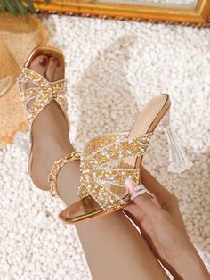 Elevate your style with our Blinged Out Roman Chic <a href="https://canaryhouze.com/collections/women-canvas-shoes" target="_blank" rel="noopener">sandals</a>. These glamorous high heel sandals feature a spiral lace up design adorned with dazzling crystals. Step out in confidence and make a statement with every step. Glamorous Rhinestone Beach Heels, Sparkling Gold Heels For Summer, Sparkling Gold Summer Heels, Roman Style, Chic Sandals, Roman Fashion, Style Party, Party Shoes, Heel Sandals