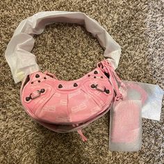 Brand New, Still Fully Wrapped Balenciaga Xs Cagole Bag In Pink Bb Monogram, Purchased Directly From Nordstrom For $2000. Currently Listed Online At Retailers For $2300+. Perfect For A Christmas Gift For Someone Special Or Yourself. Open To Reasonable Offers! Top Zip Closure Adjustable Shoulder Strap Removable Mirror And Zip Pouch Textile Made In Italy 9”W X 5 1/2”H X 3 1/2”D Designer Pink Bags For Everyday Use, Designer Pink Bag For Everyday, Designer Pink Everyday Bag, Designer Pink Shoulder Bag With Removable Pouch, Designer Pink Shoulder Bag For Shopping, Designer Pink Shoulder Bag For Everyday Use, Pink Designer Shoulder Bag For Everyday, Pink Satchel Shoulder Bag With Branded Hardware, Pink Shoulder Bag With Branded Hardware For Daily Use