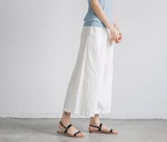 Name: Pure Color Linen Trousers White Women Slacks Pants Fabric: Fabric has no stretchSeason: Spring,Summer,Fall Pant Type: Loose pants Waist Type: High WaistLength: LongColor: Black,WhiteStyle: CasualMaterial: 100%Linen Model Size: Small Size Height/Weight:168 cm/47 kg*SIZE S (US 4-6, UK 8-10, EU 34-36)bust: fits bust around 86.4-88.9 cmwaist: fits waist around 66-68.6 cmhips: fits hips around 92.7-95.3 cm*SIZE M (US 8-10, UK 12-14, EU 38-40)bust: fits bust around 91.4-94 cmwaist: fits waist ar White Ankle-length Harem Pants, Casual Ankle-length Harem Pants For Beach, Summer Relaxed Fit Ankle-length Pants, Ankle-length Beach Pants For Spring, Summer Ankle-length Relaxed Fit Pants, Non-stretch Ankle-length Summer Pants, Non-stretch Ankle-length Pants For Beach, Spring Beach Ankle-length Pants, White Ankle-length Pants For Spring